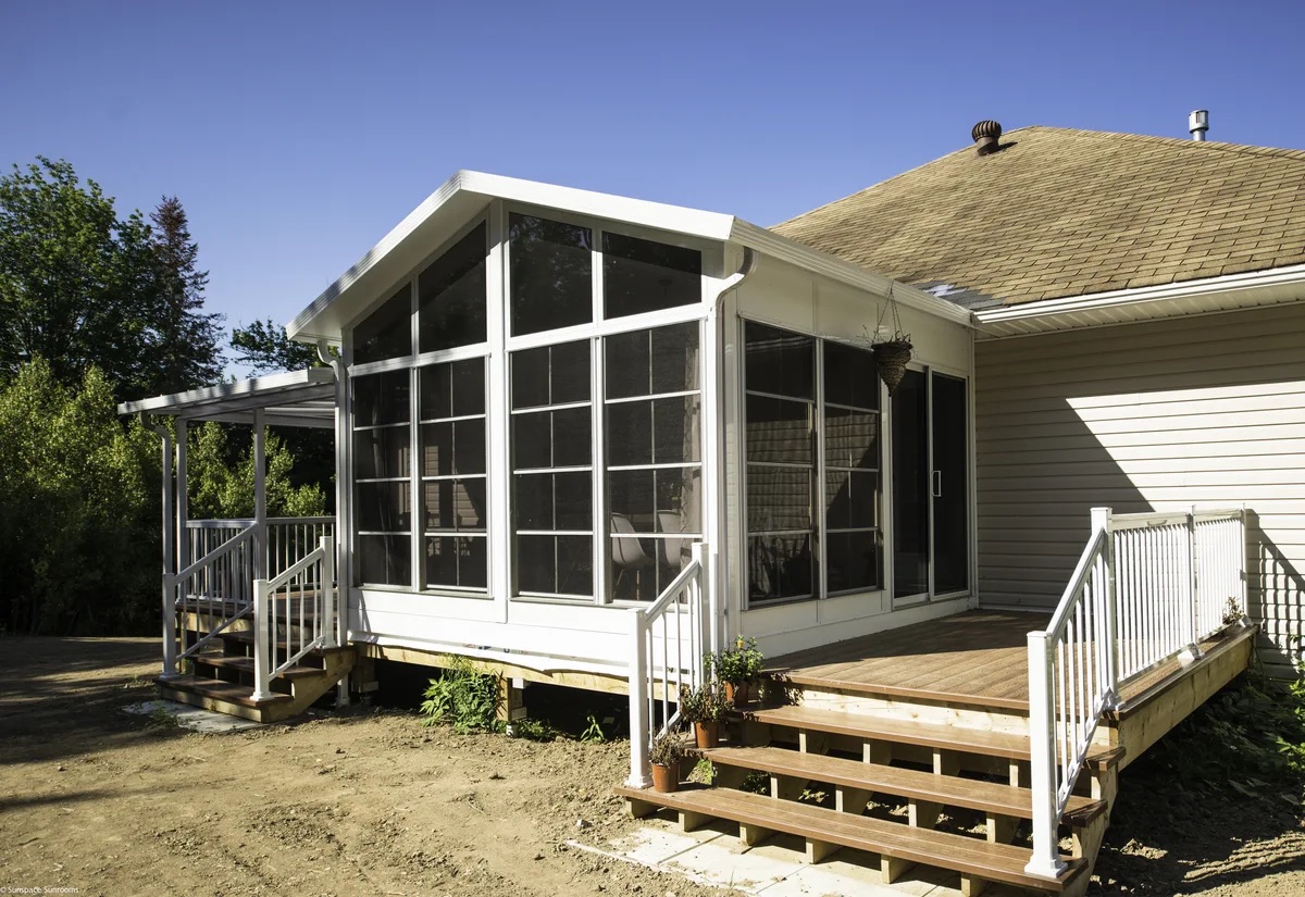 Sunspace Model 200 sunroom addition on the back of a home